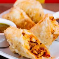 Chicken Murmuri Rolls · hand rolled shredded chicken egg rolls stuffed with peppers and onions - 6 halves