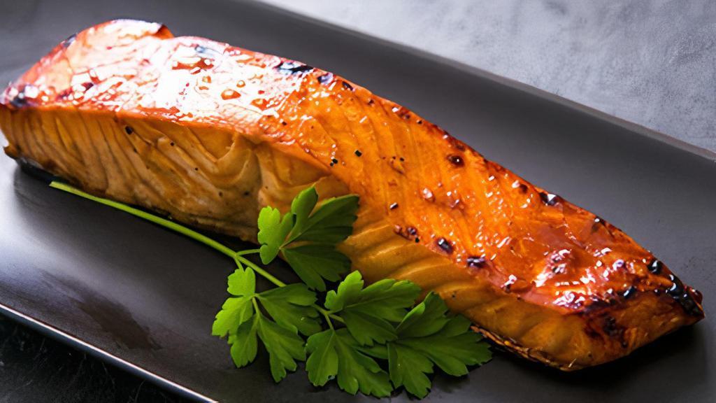 Tandoori Salmon (Gf) · succulent roasted salmon marinated overnightalong with our special blend of spices