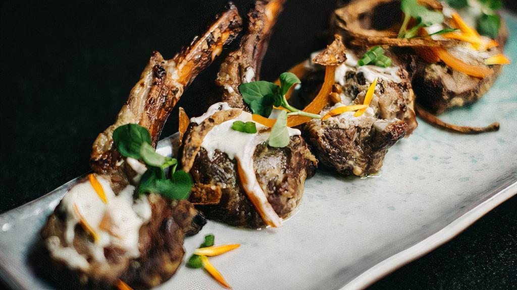 Lamb Chops (Gf) · double cut lamb marinated overnight in yogurt, green chilies, and our special blend of spices