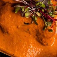 *Chicken Makhani (Gf) · chicken pieces cooked in a creamy, rich, buttery tomato gravy, made with cashew nuts