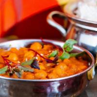 Pindi Channa Masala (V, Gf) · curried chickpeas in a tomatoes and onion based gravy