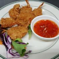 Coconut Shrimp (6) · 6 pieces hand-dipped domestic shrimp in shredded coconut and batter, then fried to a golden ...