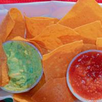 Chips And Guacamole · Fresh corn tortilla chips with salsa, and guacamole.
