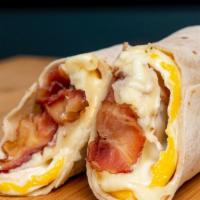 Breakfast Burrito · 3 eggs, American cheese, and choice of meat.