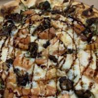 Rustica Pizza · White Pizza with garlic, Mozzarella Cheese, Figs, Arugula, Sliced Prosciutto, Goat Cheese an...