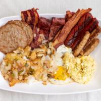 Home Fries Platter · Home fries with
Any style 2 Eggs with or without cheese, 
One choice of meat, 
One choice of...
