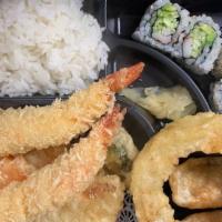 Shrimp Tempura Bento Box Combo Lunch · Served with gyoza, salad, four piece california roll and rice.