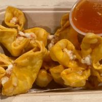 Crab Rangoon · Six pieces cream cheese wrapped with wonton skin and deep fried.