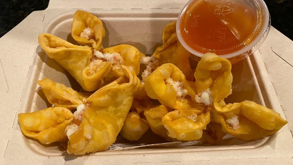 Crab Rangoon · Six pieces cream cheese wrapped with wonton skin and deep fried.