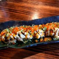 Sushi Bar Special Roll · Deep fried roll with spicy tuna, avocado, tobiko, scallion, spicy mayo and fried eel sauce.
