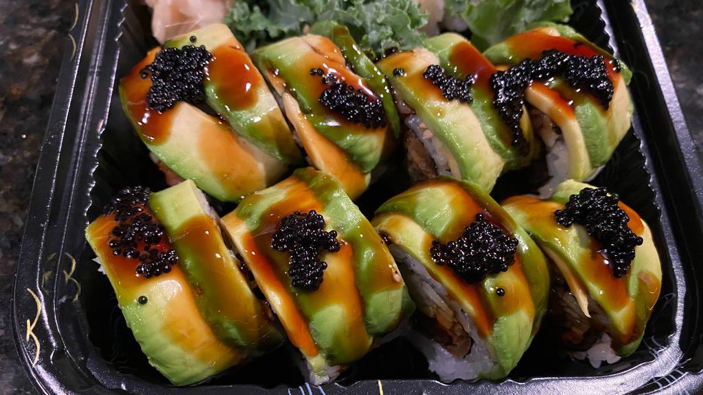 Dragon Roll · Eel, cucumber and avocado with eel sauce and tobiko. Non-raw sushi.