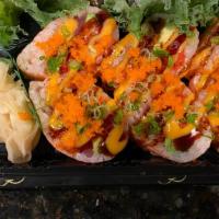 Flaming Heart · Tuna, salmon, crab stick, caviar, avocado and spicy tuna wrapped with soybean nori, spicy ma...