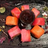 Sakana Roll · Spicy tuna, salmon, yellowtail, cucumber and asparagus inside. Topped with tuna, salmon and ...
