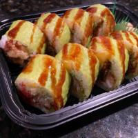 Spider Man Roll · Soft shell crab tempura, cucumber, avocado, spicy tuna, mango, wrapped with soybean paper. T...