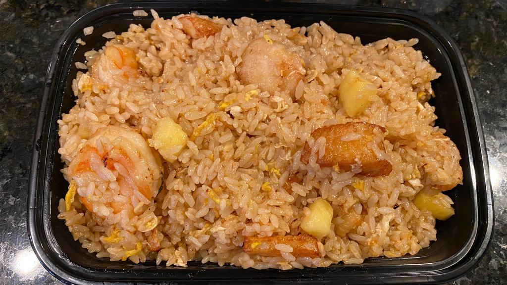 Pineapple Seafood Japanese Fried Rice · Fried rice cooked with fresh pineapple, shrimp, scallops and fish.