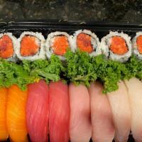 Sushi Deluxe · Nine pieces of sushi with choice of spicy tuna roll or shrimp tempura. Served with choice of...