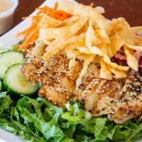 Asian Sesame Chicken · Marinated grilled chicken, sesame, mixed greens, shredded carrots, red onions, crispy wonton...