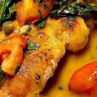 Chicken Piccata · sautéed chicken breast in a lemon white wine sauce, with tomatoes, capers, and herbs