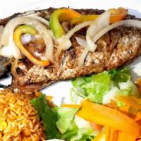 Red Snapper · Whole red snapper fish deep fried. Served with salad, plantains and rice. Ask staff about ch...