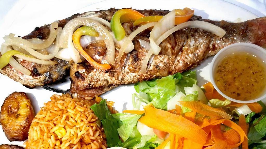 Red Snapper · Whole red snapper fish deep fried. Served with salad, plantains and rice. Ask staff about charcoal grill.