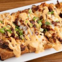 Buff Chicken Pizza Puff · Ranch base with Buffalo Chicken, Bacon, Scallion, 3 Cheese Blend, and topped with Buff Blue ...