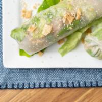 Chicken Caesar Spring Roll · Chicken, Bib lettuce, seasoned wonton crumbles, and house made Caesar dressing all in a fres...