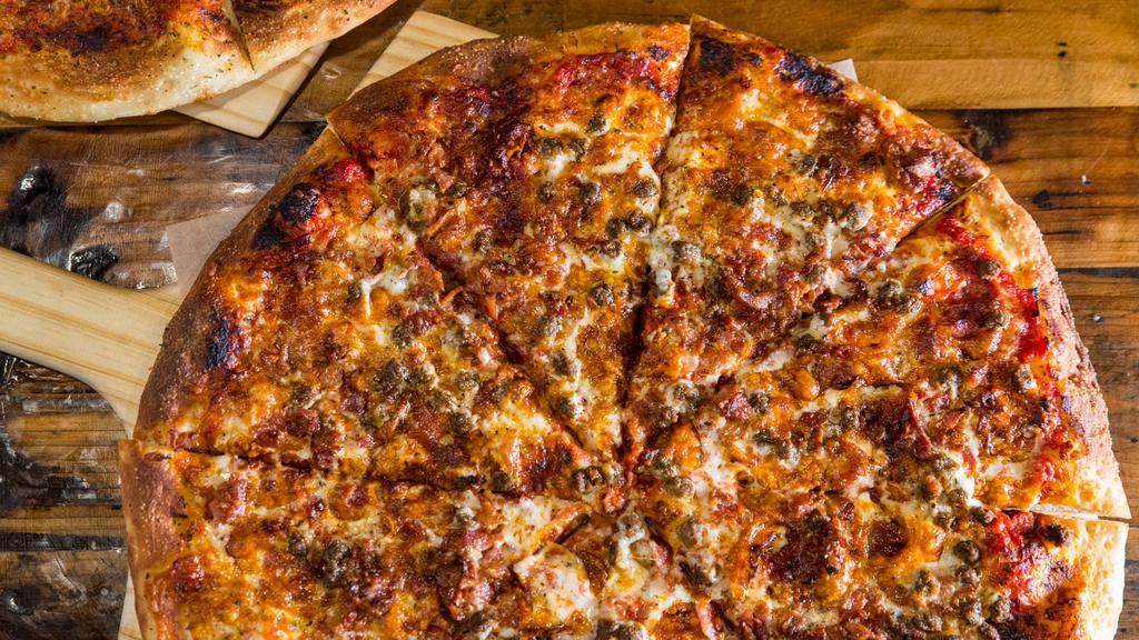 Meat Lovers · Tomato sauce, shredded cheese, pepperoni, sausage, and crumbled bacon.