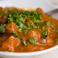Lamb Curry · Tender lamb pieces cooked in curry with Kashmiri herb and spice.
