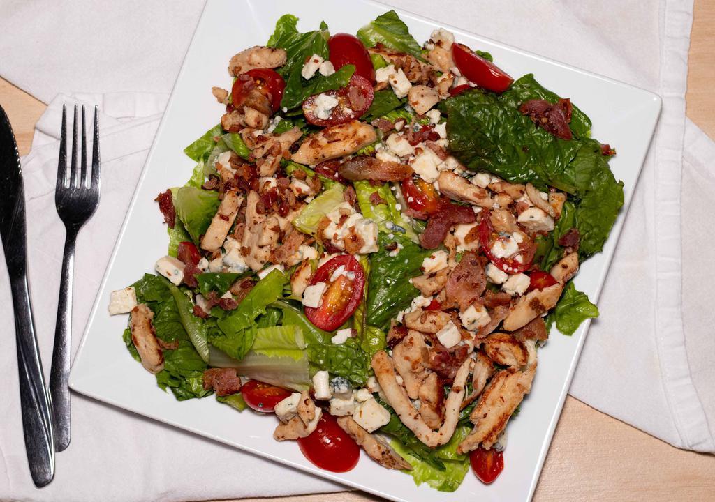 Cobb Salad (Large) · Organic spring mix, dried cranberry, caramelized walnuts, Italian sun-dried tomato, crumbled goat cheese, and balsamic vinaigrette.