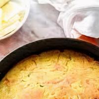 Iron Skillet Cornbread · Six (6) slices of fresh cornbread baked with buttermilk, creamed corn, jalapeno peppers, and...
