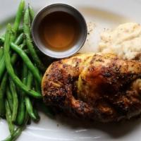 Wood-Fired Rotisserie Chicken · Our specialties. Slow-roasted to bring you maximum flavor. Served with mashed potatoes and g...