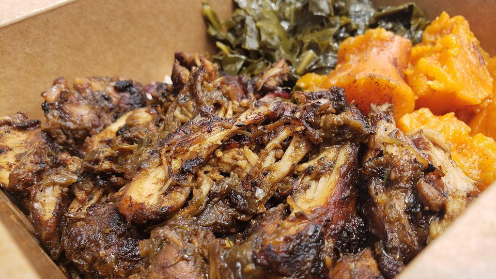 Jerk Chicken · Grilled Chicken Tossed in our Signature Jerk Sauce, Served with Rice and Peas, Collard Greens and Candied Yams