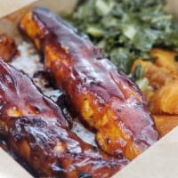 Bbq Salmon · Grilled Salmon Glazed in a Honey Hickory BBQ Sauce, Served with Rice and Peas, Collard Green...