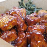 Bbq Tofu · Fried Tofu Glazed in a Honey Hickory BBQ Sauce, Served with Rice and Peas, Collard Greens an...