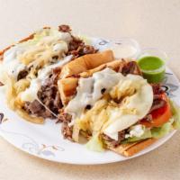 Steak & Cheese · Served with Fries