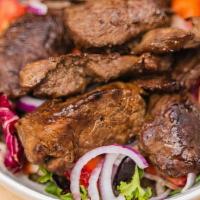 Steak Tip Salad · Served with pita bread and choice of dressing.