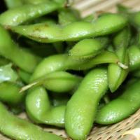 Edamame  · Blanched soybeans served with  sea salt or wasabi Garlic or Chili  Garlic