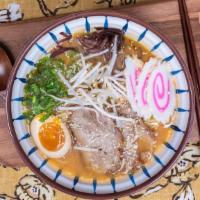 Sapporo Miso Ramen  · chicken broth with miso paste and wavy egg noodle.Served with Cha Shu(Marinated Pork). bean ...