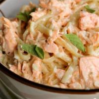 Salmon Alfredo · Penne pasta covered in chef's homemade alfredo sauce blended in 5 cheeses.  topped w/ delici...