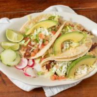 Fish Tacos · Flounder. Rice, lettuce, queso fresco, chipotle mayo, pico de gallo, and avocado.