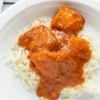 Chicken Vindaloo · Boneless chicken cooked with potatoes and tangy sauces.