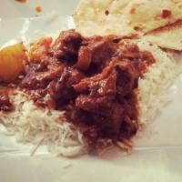 Lamb Vindaloo · Spicy. Chunks of tender leg of lamb and potatoes in a hot curry sauce. Served with basmati r...