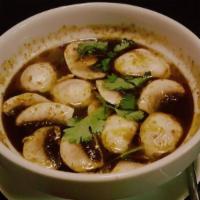 Tom Yum · Spicy. Gluten-free. Thai spicy and sour soup in lemongrass broth with mushrooms and cilantro.