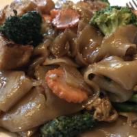 Pad C U · Gluten-free. Flat noodle wok stir-fried with broccoli and carrots in sweet soy sauce.