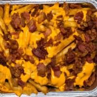 Rizzo'S Crazy Fries · With nacho cheese and bacon bits.