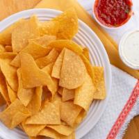 Chips & House Salsa · Dip made from tomatoes and onions.
