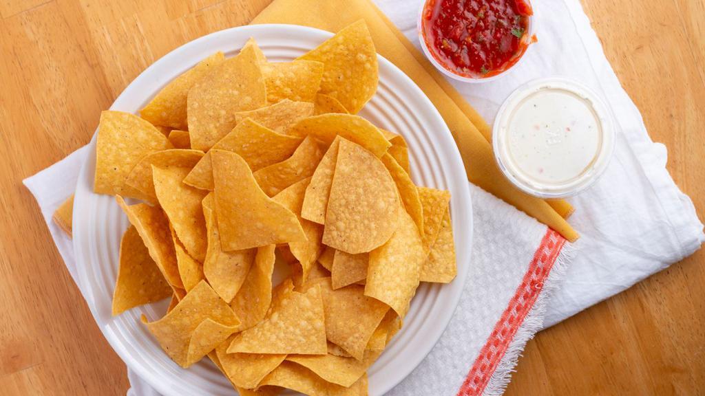 Chips & House Salsa · Dip made from tomatoes and onions.