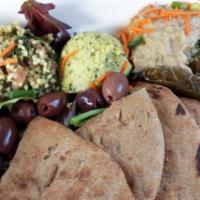 Mediterranean Mezze Platter · Vegan. Organic millet tabbouleh, edamame-basil hummus, baba ghanoush, stuffed grape leaves, ...