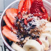 Almond Butter Me Up · organic acai, banana, and blueberries topped with gluten-free granola, banana, strawberries,...
