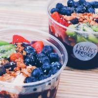 Rainbow Bowl · organic acai, banana, and blueberries topped with gluten-free granola, banana strawberries, ...